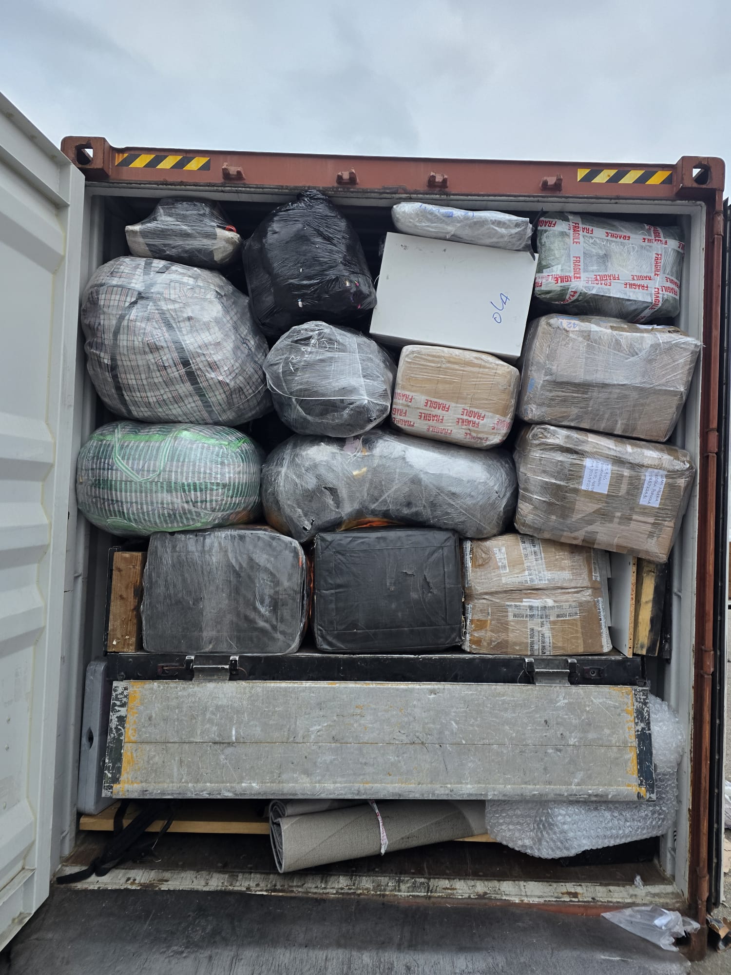 Precebol Logistics fully loaded shipping container packed with customer cargo for Nigeria