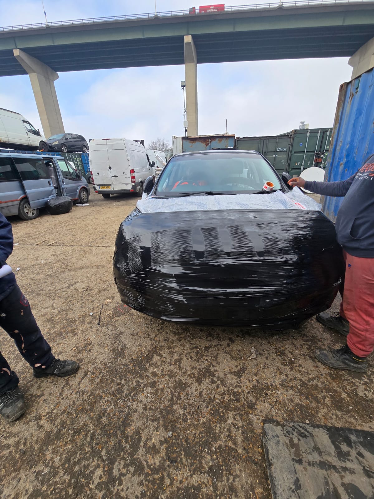 UK car being wrapped and prepared by Precebol team for export to Nigeria